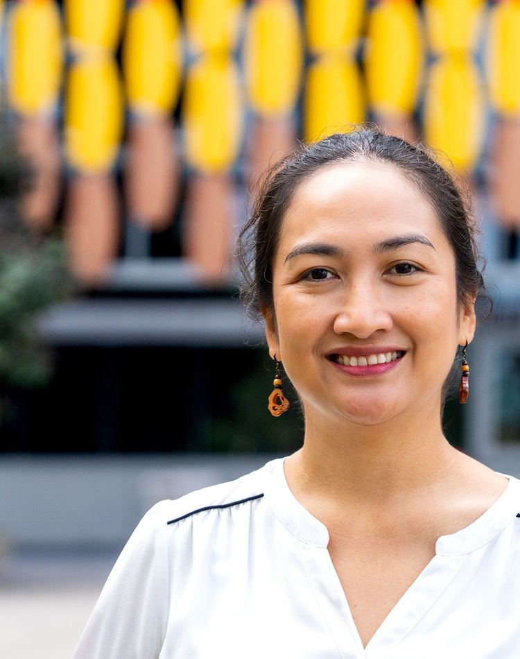 A woman smiling at the camera