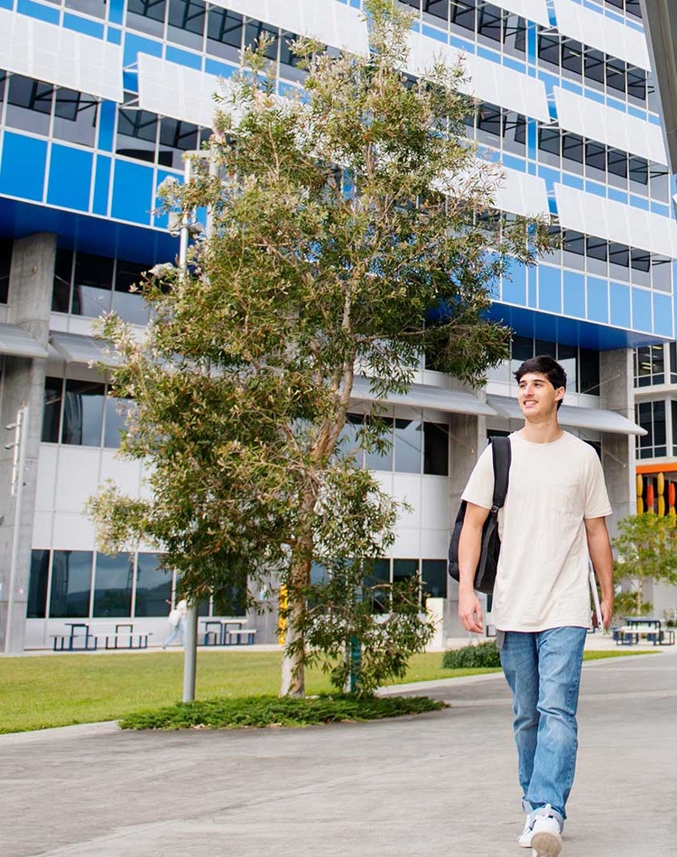 student walking at Gold Coast campus