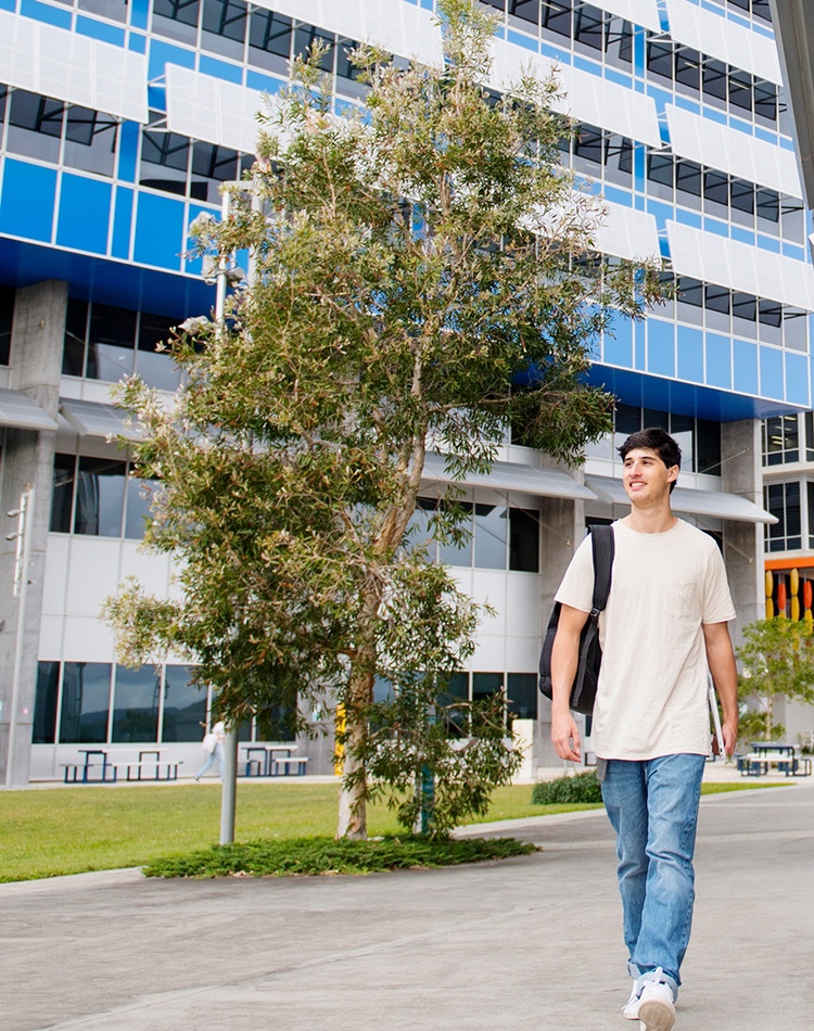 student walking at Gold Coast campus