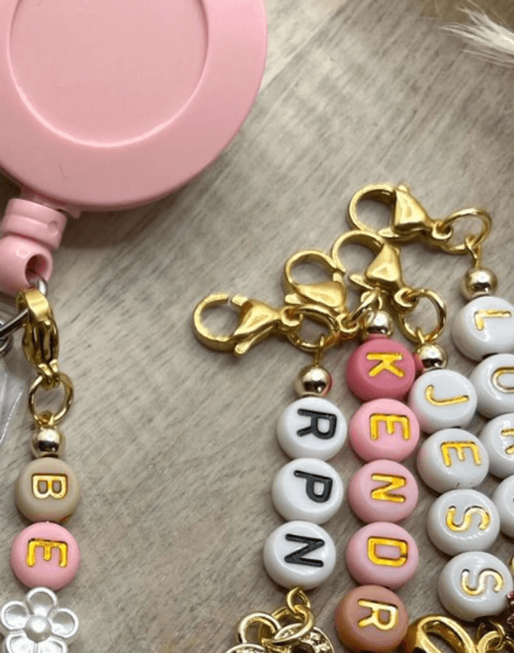 Badge reels with beads