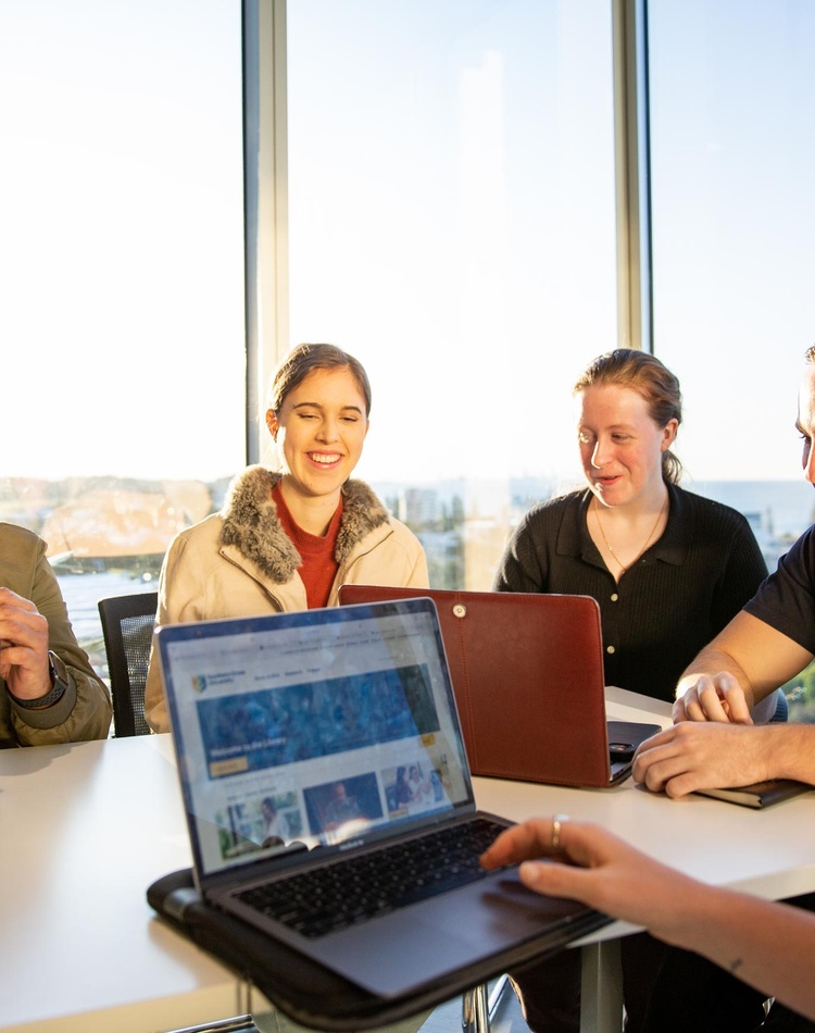 Group of five students studying together on the Gold Coast campus