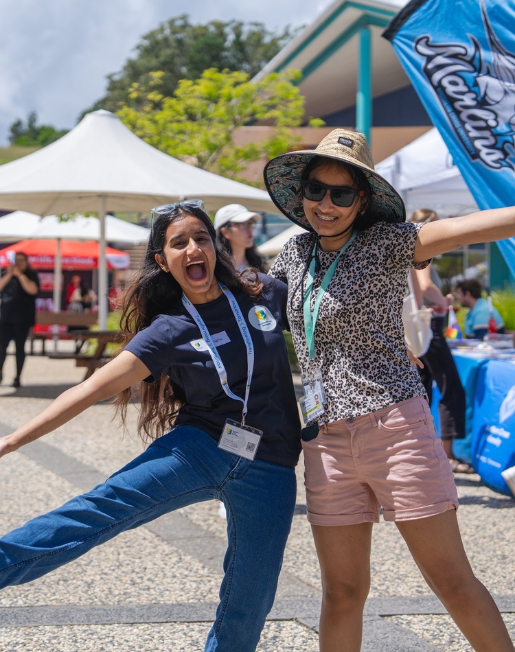 Two Vollies yell excitedly at an SCU event.