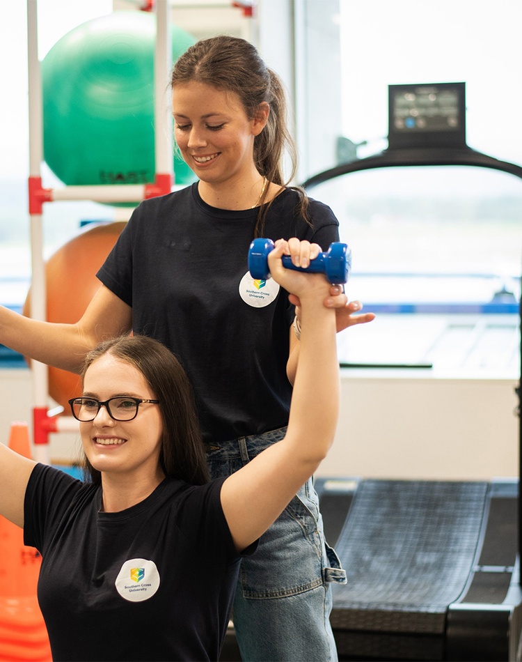 Two students working out in the Gold Coast Gym
