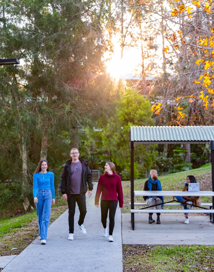students walking down path