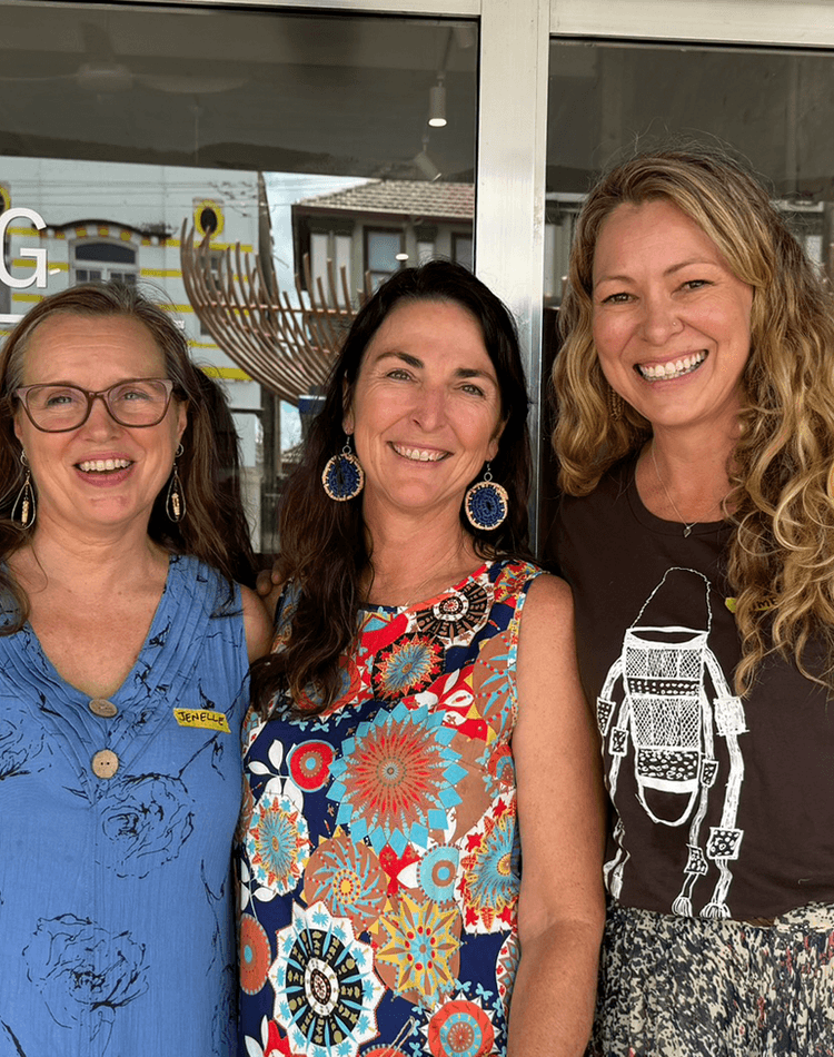 Three women smiling at camera outside the Living Lab Northern Rivers
