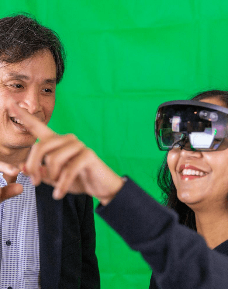 Two people using VR goggles