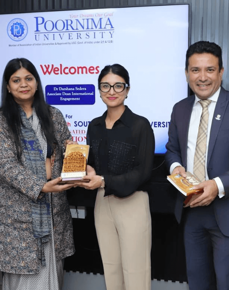 Group of people holding an award