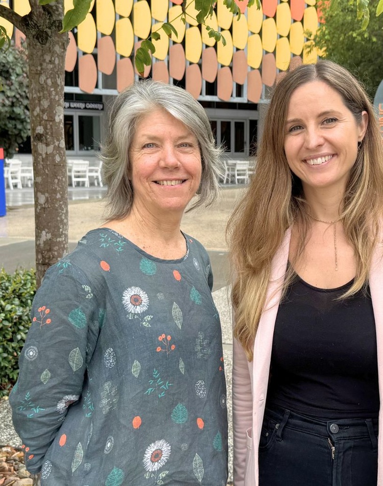 Dr Louise Whitaker & Jessica Jeffreys standing outside SCU Gold Coast campus
