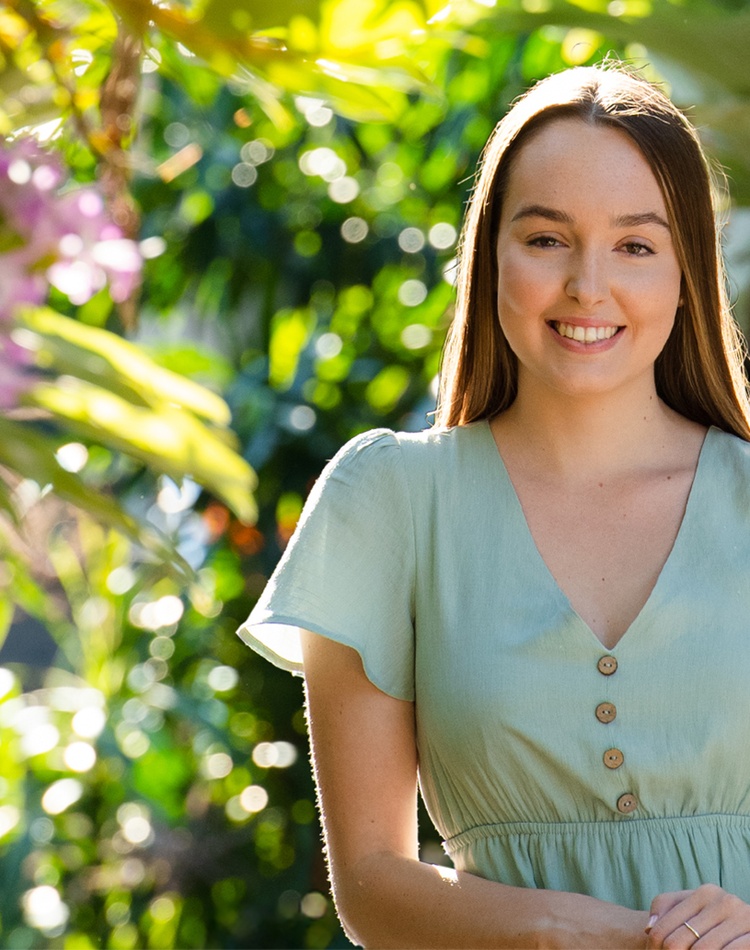 Student standing in the sun