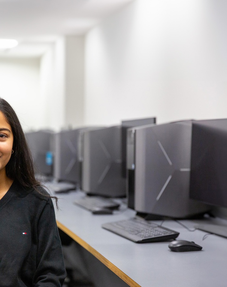 Mrisha Upadhyay in the SCU computer lab, master of computing