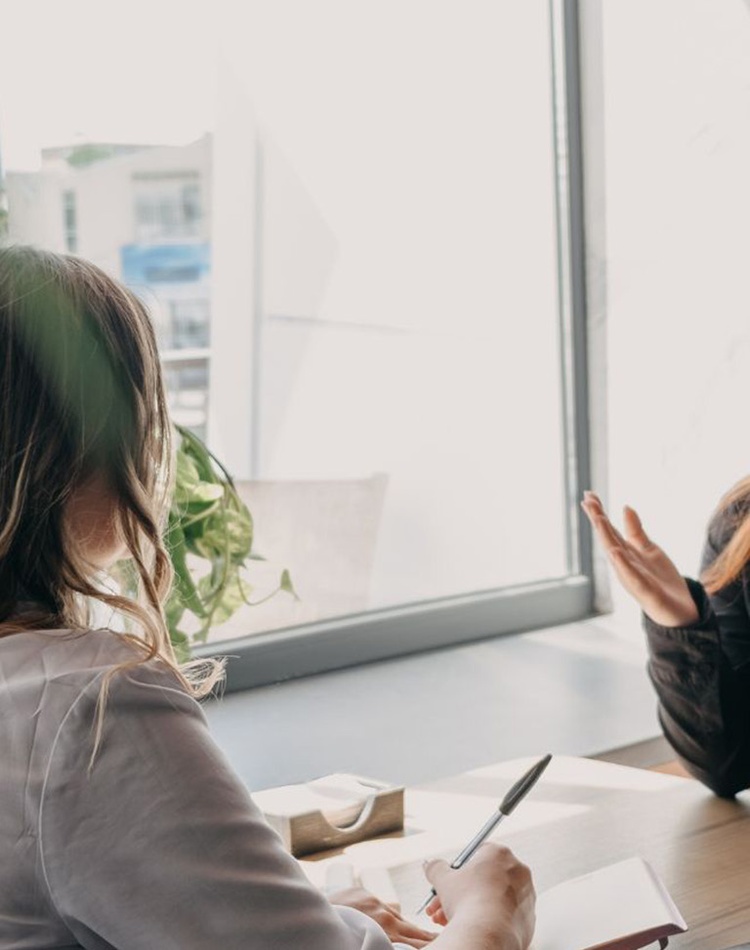 A student speaking to a counsellor