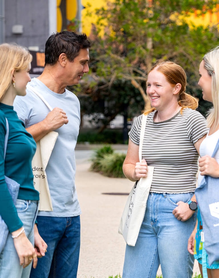 Future students of Southern Cross University chatting at the Gold Coast Open Day