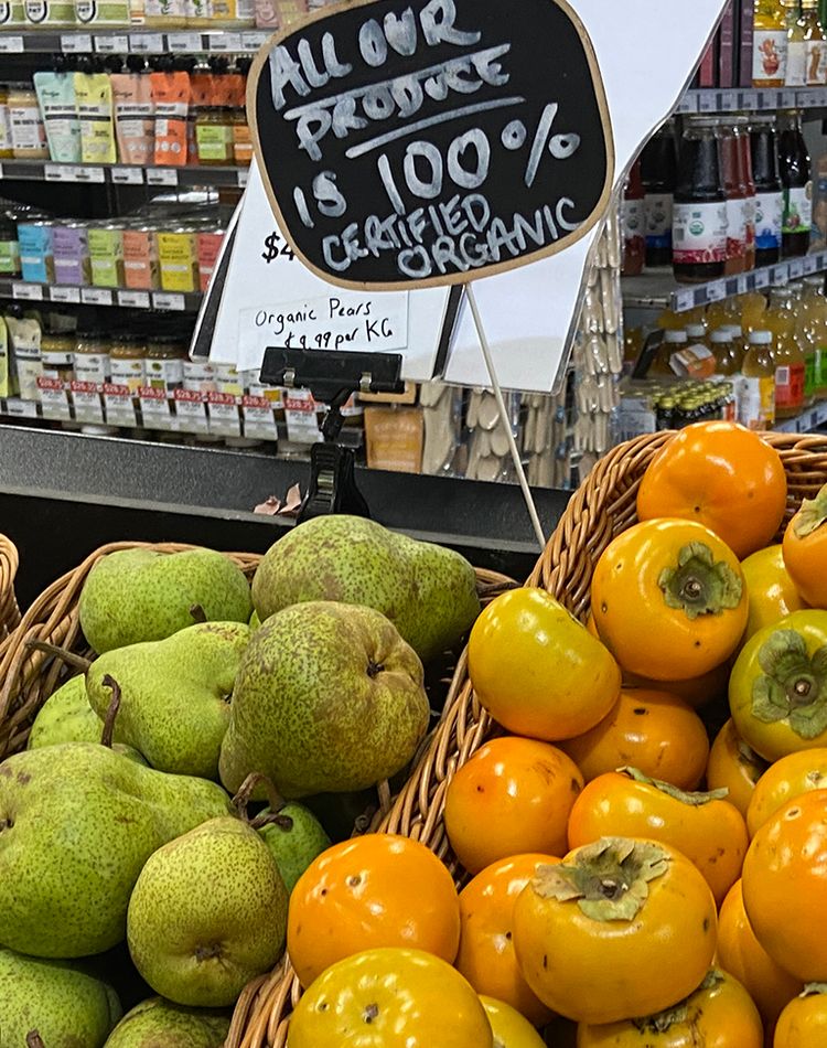 Fruit and vegetables marked Certified Organic Produce in a shop