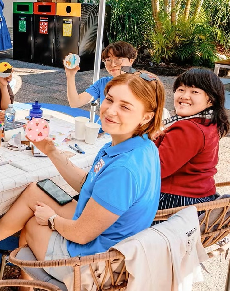 Students painting at a LEXSA workshop outdoors