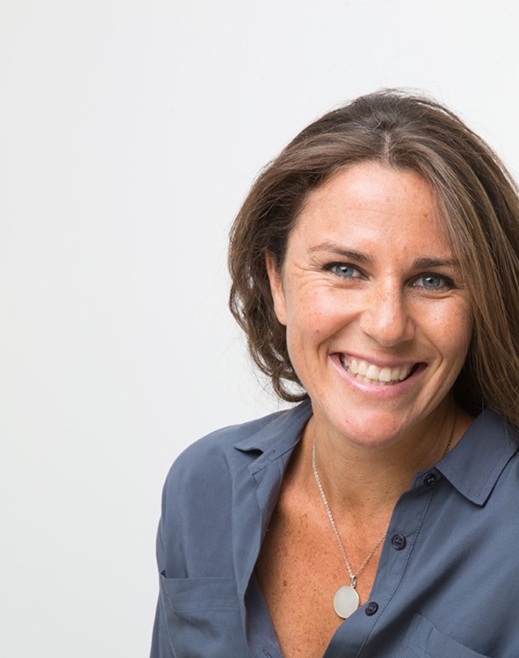 Jules Allan Social Science alumni smiling at camera