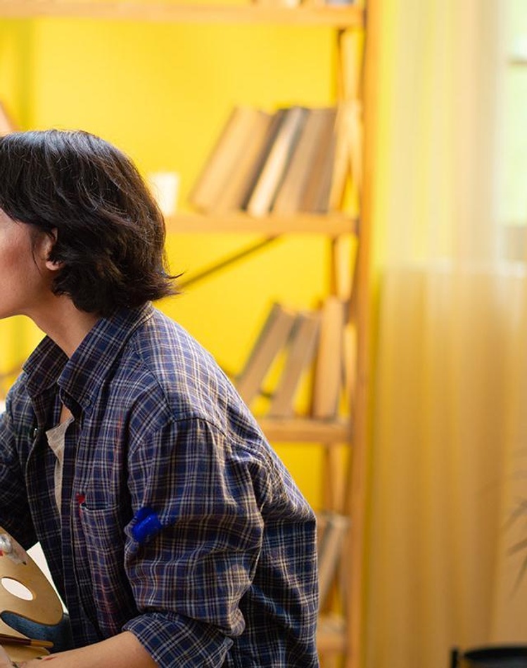 Lady painting artwork