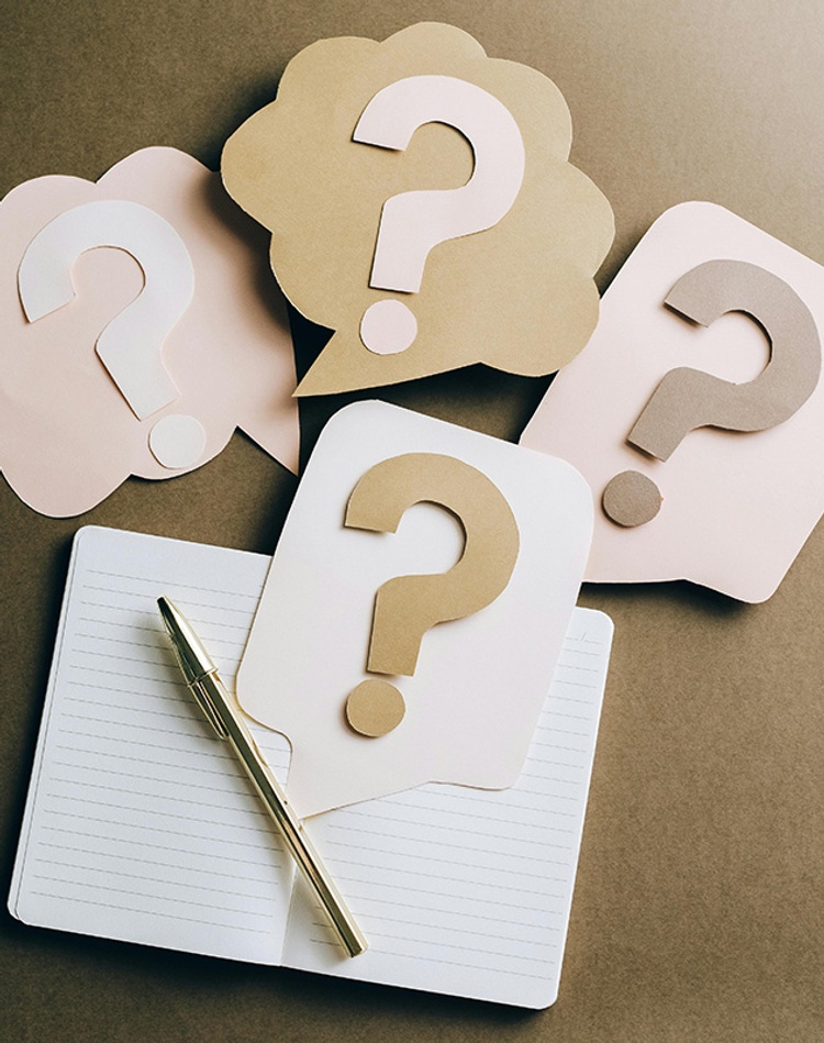 paper cut outs of symbol for question mark