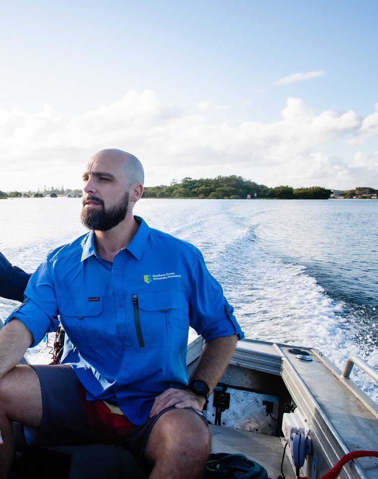 Two people on a boat on a river