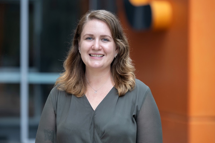 Student outside Building C at the Gold Coast