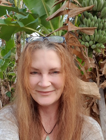 Master of Lifestyle Medicine graduate Teena Quinn in front of greenery