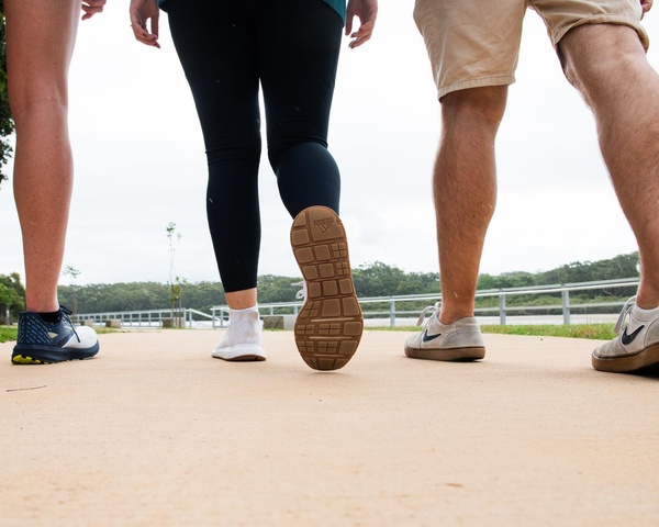 Shot of legs and feet walking away from camera