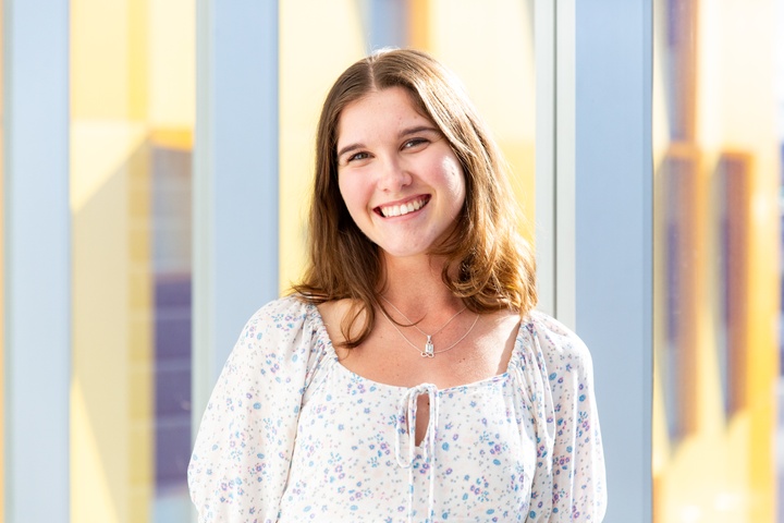Student smiling at camera