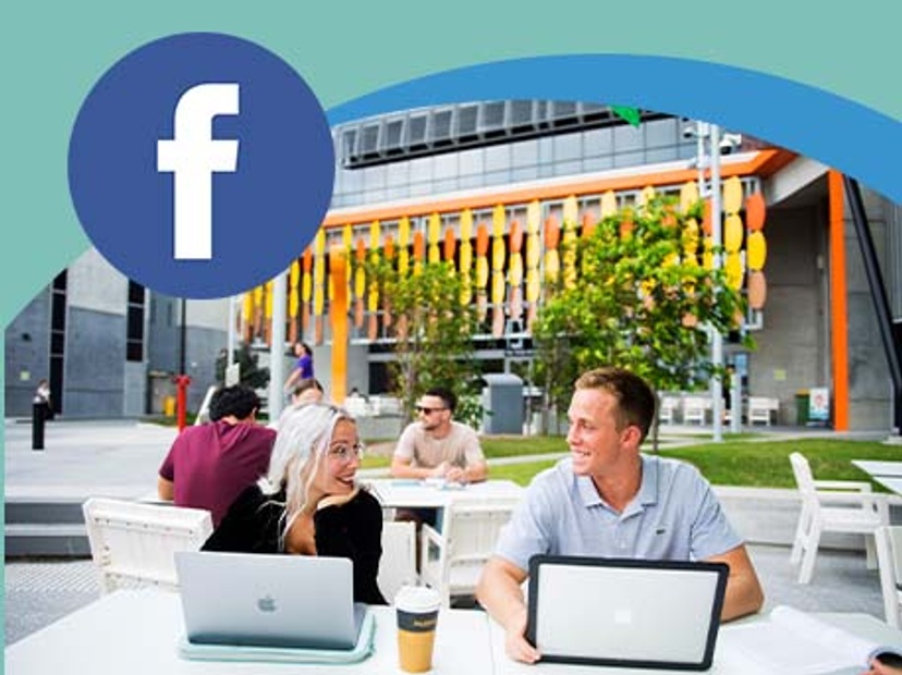 Two students sitting with their laptops - image has Facebook logo