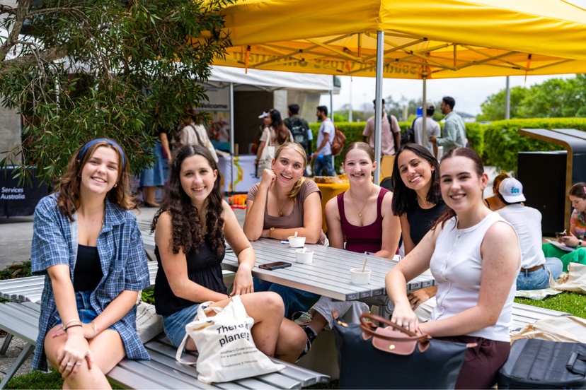 Gold Coast campus students sitting at a table