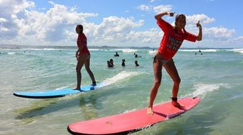 two women surfing