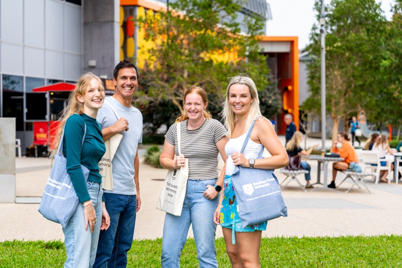 Four students standing on SCU Gold Coast Campus