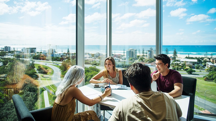 Students at Gold Coast campus with ocean views in background