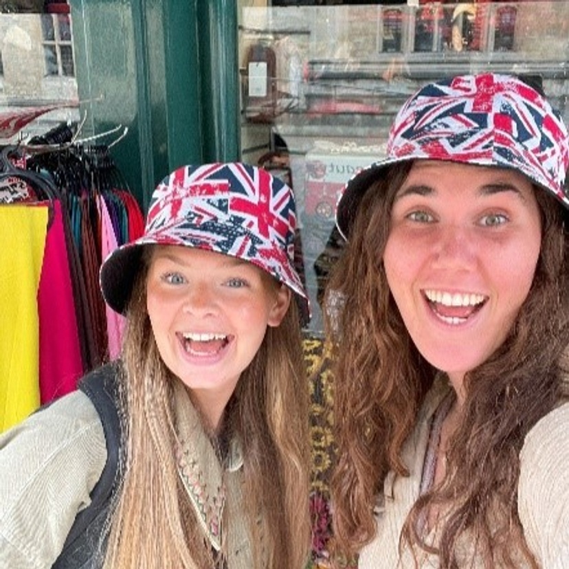 Selfie of student Laura with friend in British flag hats