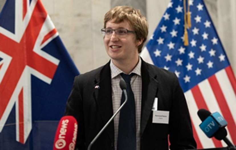 Dr Hammond Pearce speaking into microphone