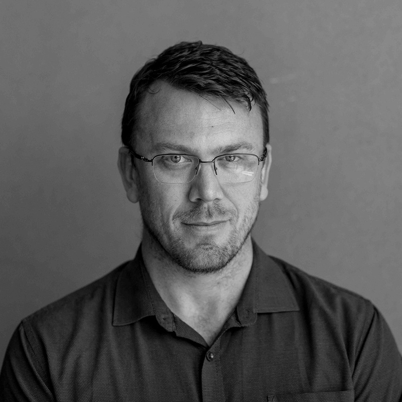 headshot of Brendan Walker-Munro greyscale in colour - 1-1 scale