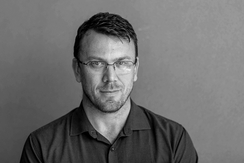 headshot of Brendan Walker-Munro - greyscale in colour