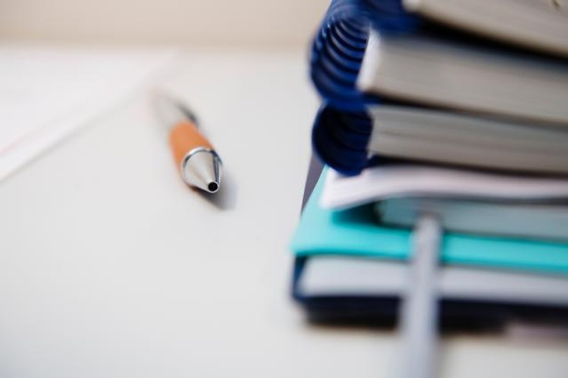 Pen and books