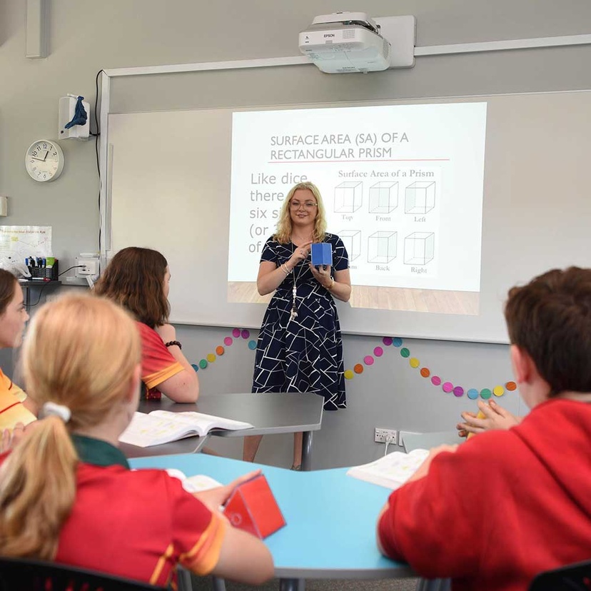 Holly Millican in classroom with students - RS22225