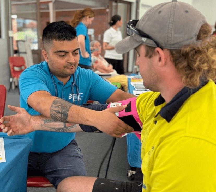 Male SCU Nursing student with community member