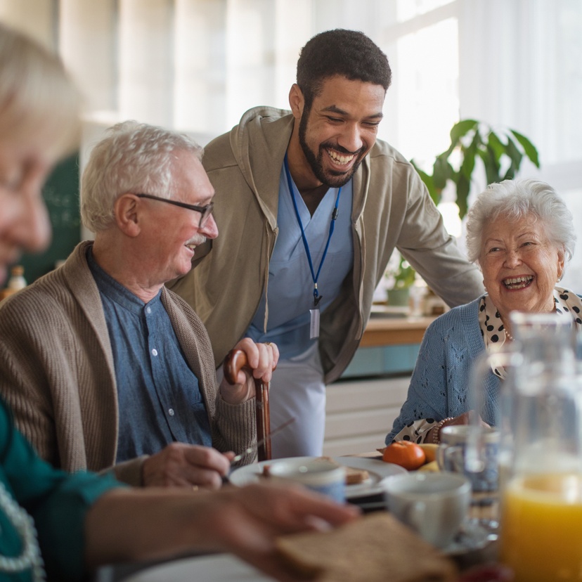 Aged care assistant with two residents