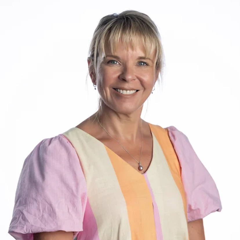 head and shoulders of female smiling