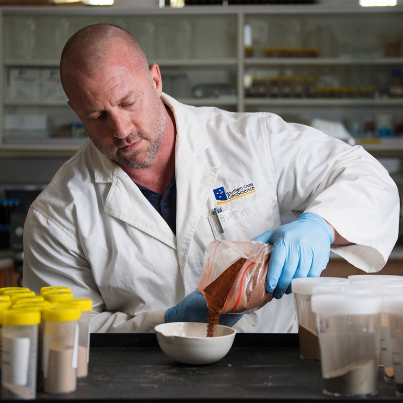 Professor Ed Burton working in lab with soil samples