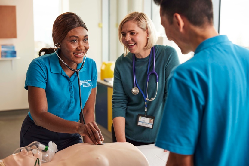 three students with patient