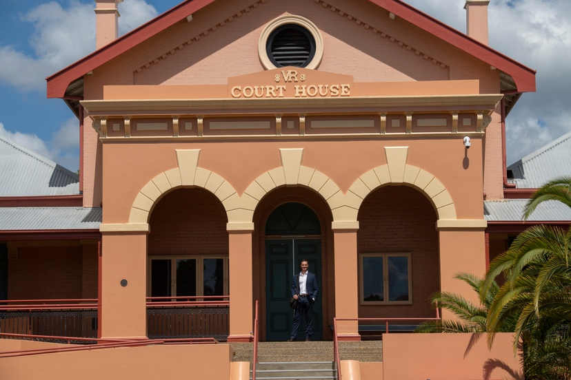 Law alumni standing at Lismore courthouse