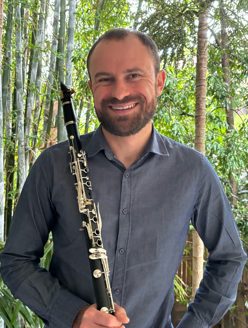 Male holding a clarinet