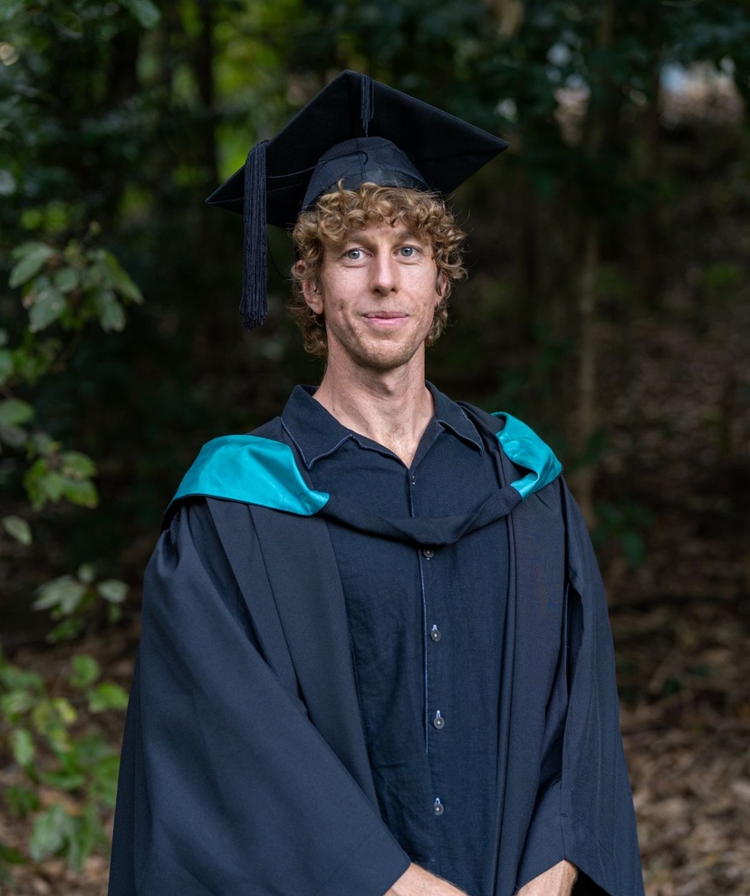 Male in graduation robe