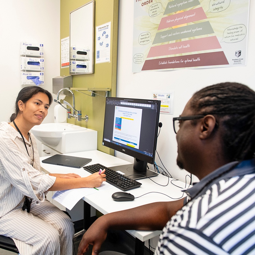 Naturopathic student consulting with a client during clinical placement