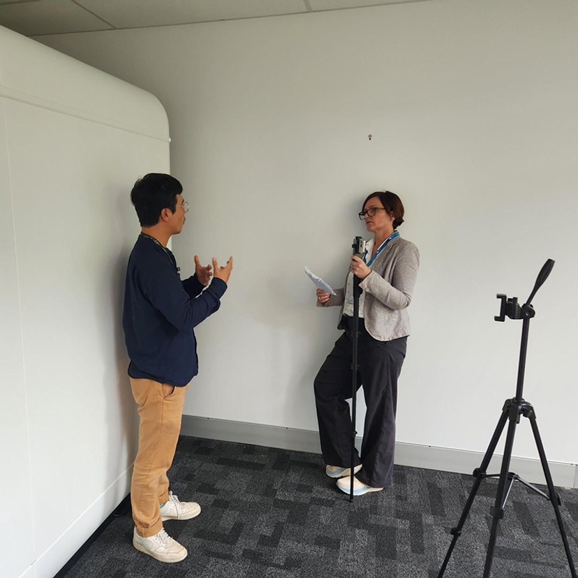 Research Fellow Dr Kwanho Jeong and Head of Content Lee Adendorff practice on-camera interview skills.