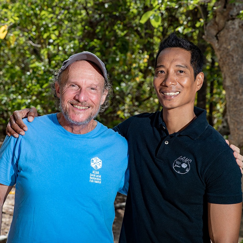 Distinguished Professor Peter Harrison and International Alumnus of the Year Dexter dela Cruz