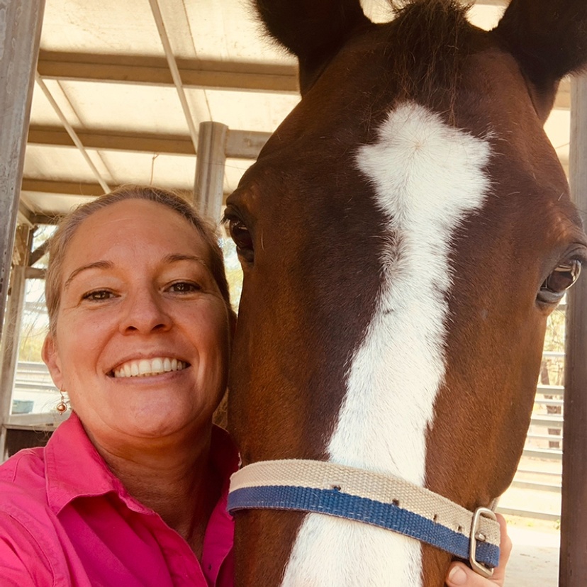 Sarah-Jane Wilson, Director, Academic Accreditation, Veterinary Science with a horse