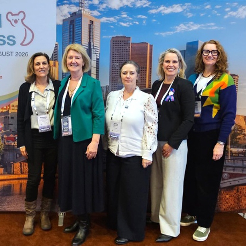 Five CCYP staff standing at ISPCAN Congress